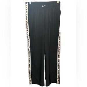 Women’s NIKE PRO TEAR-AWAY PANTS size LARGE